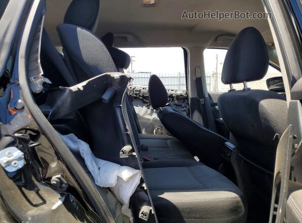 JN8AT2MT2HW153083 2017 NISSAN ROGUE Black Vista de los asientos traseros