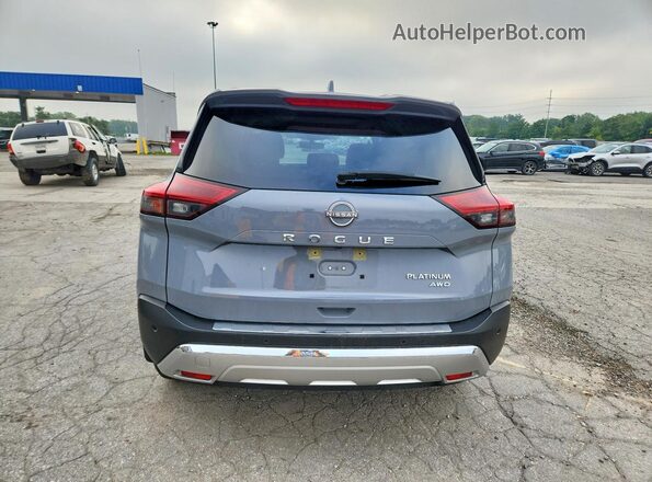 JN8BT3DD0PW309039 2023 NISSAN ROGUE Blue Rear view