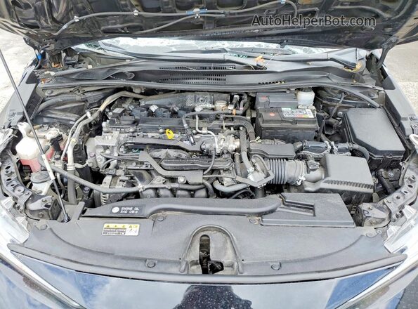 JTDB4MEE1PJ004992 2023 TOYOTA COROLLA Black Vista interior trasera