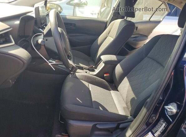 JTDB4MEE8PJ011826 2023 TOYOTA COROLLA Blue Front interior view