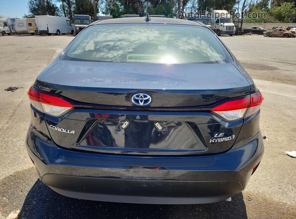 JTDBCMFE0R3060852 2024 TOYOTA COROLLA Серый Вид сзади
