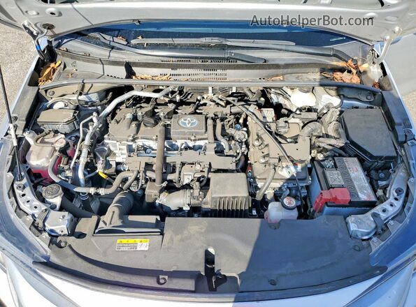 JTDBCMFE1P3008367 2023 TOYOTA COROLLA Silver Rear interior view