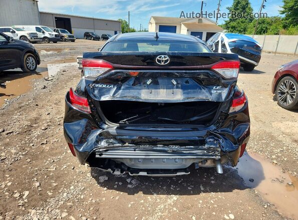 JTDBCMFE5T3119725 2026 TOYOTA COROLLA Black Հետևի տեսք