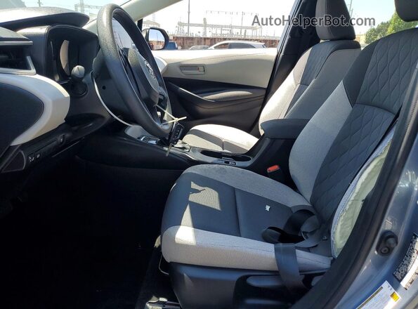 JTDBCMFE9T3130856 2026 TOYOTA COROLLA Серый Вид салона спереди