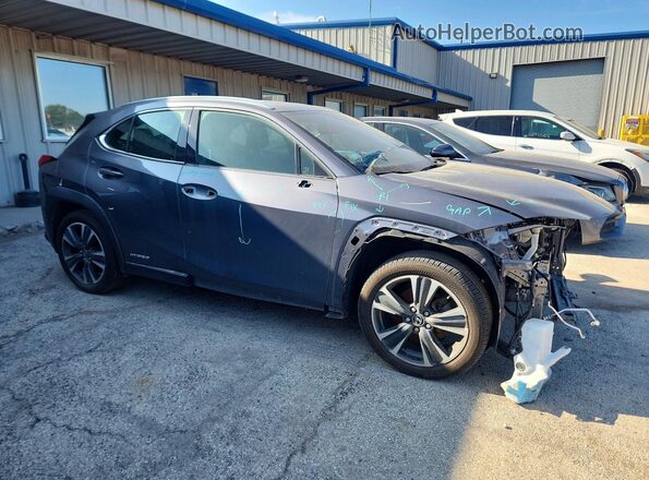 JTHU9JBH4K2017521 2019 LEXUS UX Gray Delantero derecho