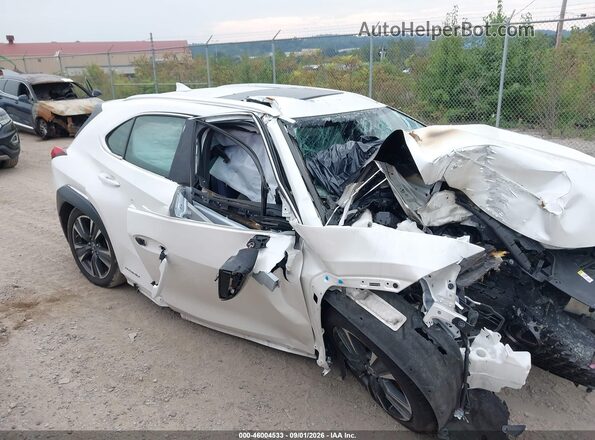 JTHU9JBH5K2015695 2019 LEXUS UX 250H White ხელსაწყოთა პანელის ხედი