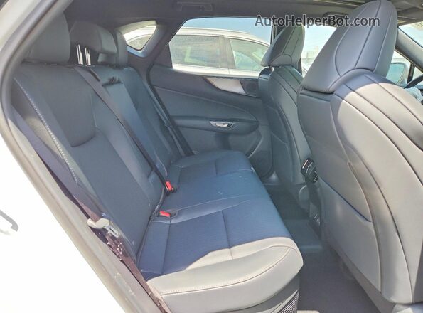 JTJKKCFZ1S2072372 2025 LEXUS NX White Вид задньої частини салону