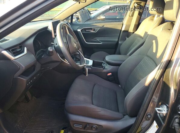 JTM16RFV3PD100333 2023 TOYOTA RAV4 Gray Vista interior delantera