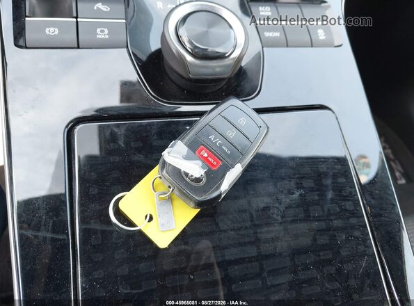 JTMAAAAA7PA016117 2023 TOYOTA BZ4X Белый Вид панели приборов