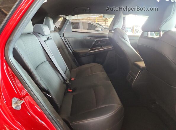 JTMABABA9PA024439 2023 SUBARU SOLTERRA Red Vista de los asientos traseros