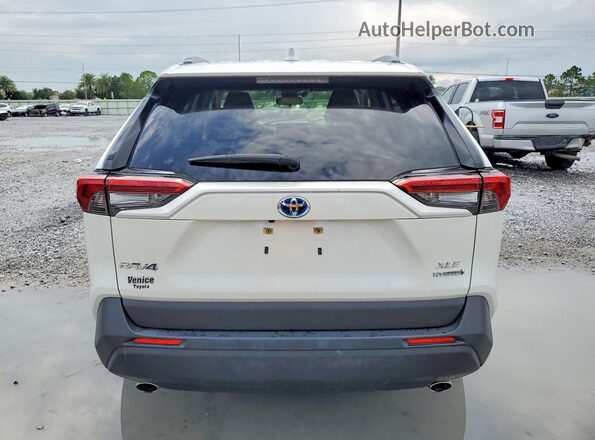JTMB6RFVXMD009575 2021 TOYOTA RAV4 White Widok z tyłu