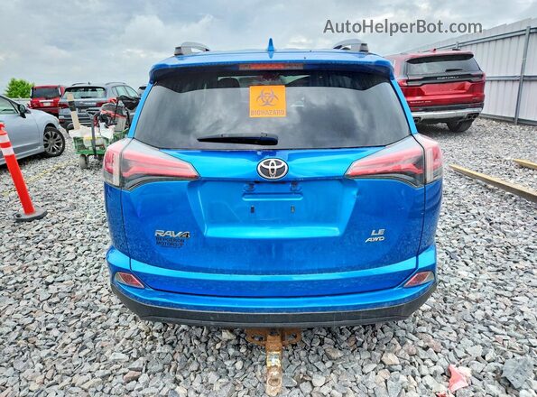 JTMBFREV0HJ713857 2017 TOYOTA RAV4 Blue უკანა ხედი