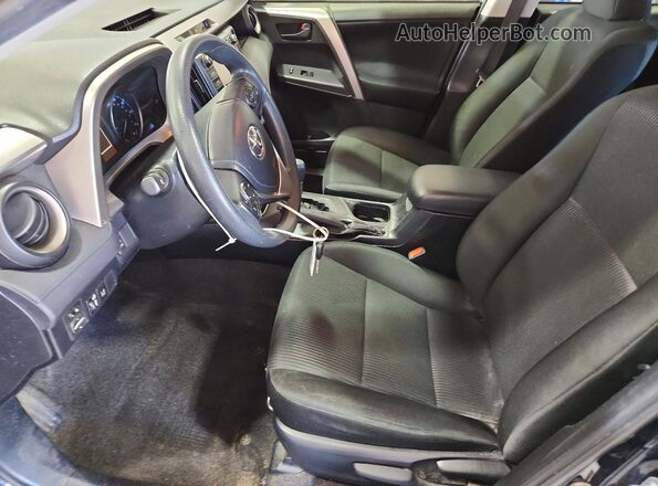 JTMBFREV1JJ219724 2018 TOYOTA RAV4 Blue Front interior view