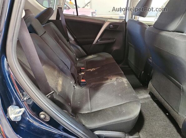 JTMBFREV1JJ219724 2018 TOYOTA RAV4 Blue Rear interior view