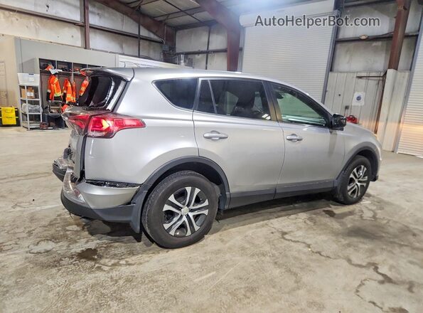 JTMBFREV2JJ247709 2018 TOYOTA RAV4 Gray Trasero derecho