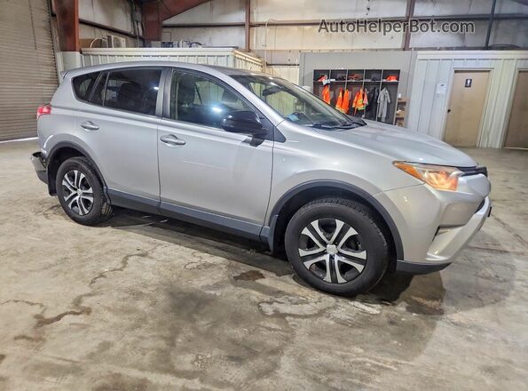 JTMBFREV2JJ247709 2018 TOYOTA RAV4 Gray Delantero derecho