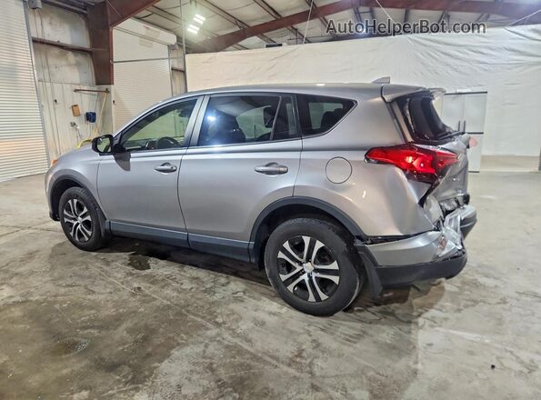 JTMBFREV2JJ247709 2018 TOYOTA RAV4 Gray Trasero izquierdo