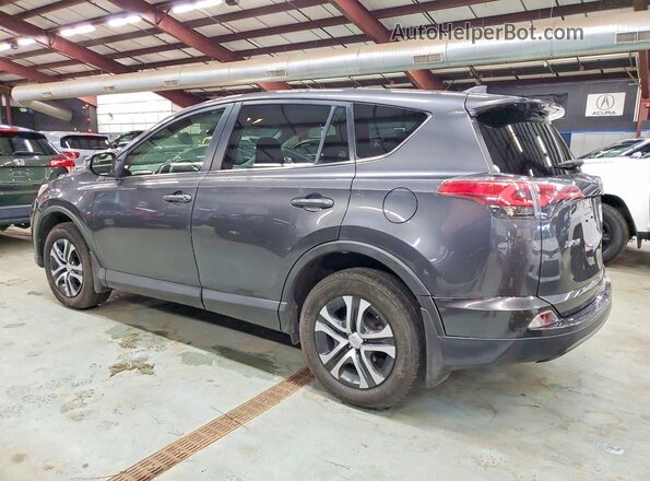 JTMBFREV4JJ737584 2018 TOYOTA RAV4 Gray Rear left