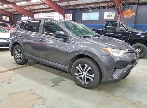JTMBFREV4JJ737584 2018 TOYOTA RAV4 Gray Front right