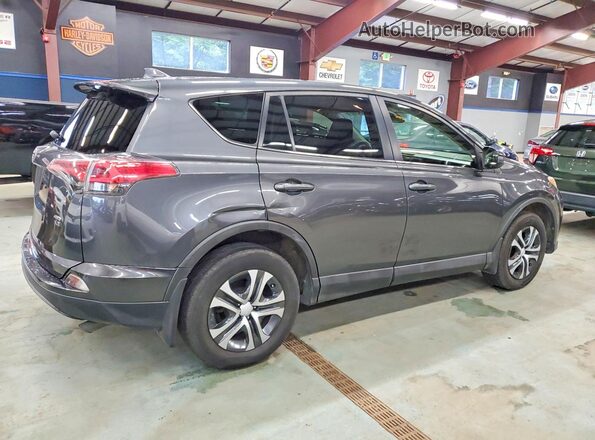 JTMBFREV4JJ737584 2018 TOYOTA RAV4 Gray Rear right