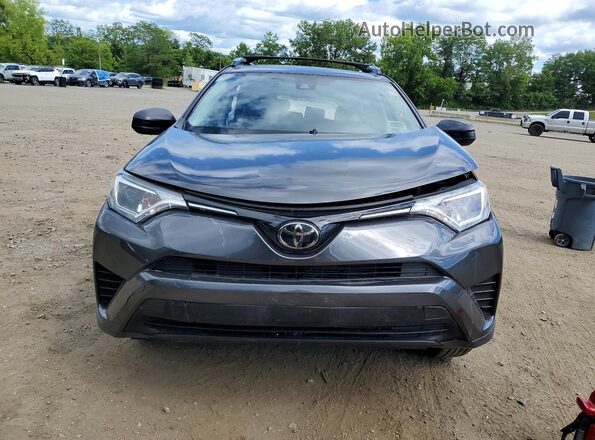 JTMBFREV6JJ740860 2018 TOYOTA RAV4 Gray Դիմացի տեսք