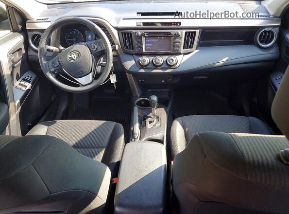 JTMBFREV7JJ196451 2018 TOYOTA RAV4 Серебряный Вид панели приборов