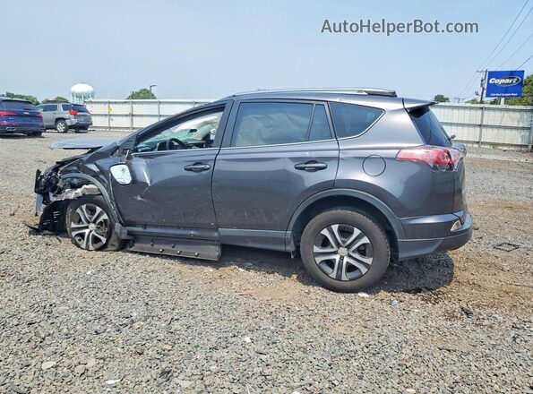 JTMBFREV9JJ744319 2018 TOYOTA RAV4 Black Trasero izquierdo