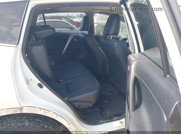 JTMDFREV0JJ185705 2018 TOYOTA RAV4 White VIN კოდის სტიკერის ხედი