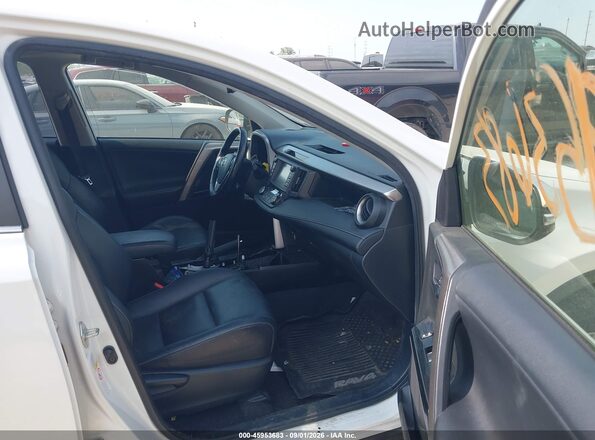 JTMDFREV0JJ185705 2018 TOYOTA RAV4 White წინა სალონის ხედი