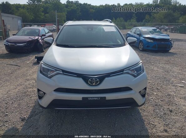 JTMDFREV0JJ185705 2018 TOYOTA RAV4 White ხელსაწყოთა პანელის ხედი