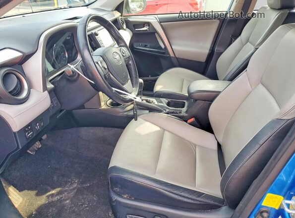 JTMDFREV3GJ072422 2016 TOYOTA RAV4 Синий Вид салона спереди
