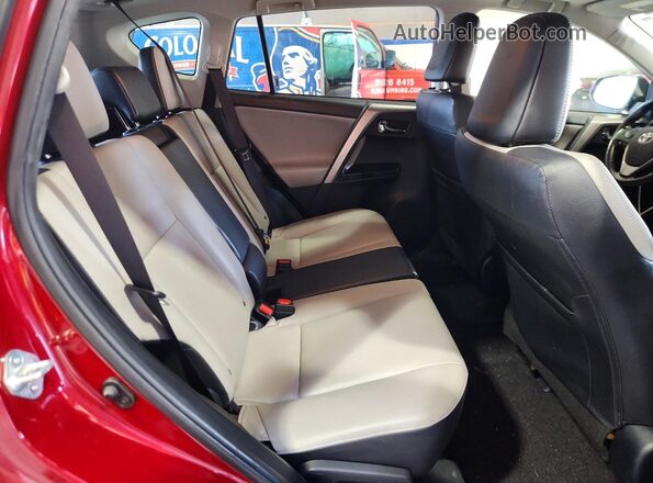 JTMDFREV8JD238522 2018 TOYOTA RAV4 Бордовый Вид задней части салона