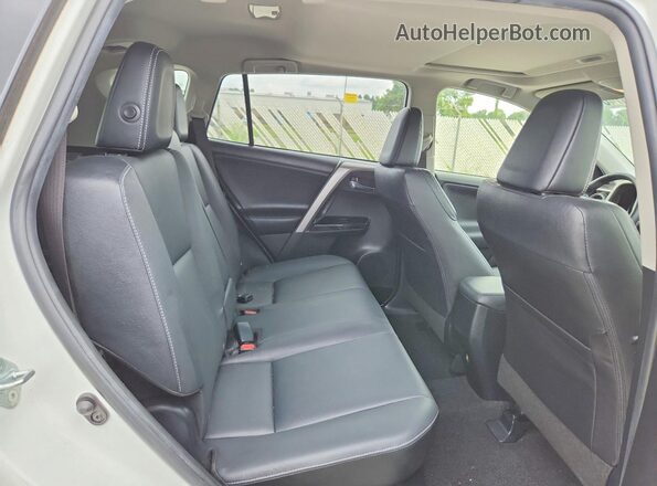JTMDJREV8GD018112 2016 TOYOTA RAV4 Белый Вид задней части салона