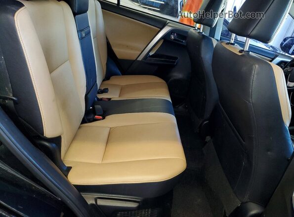 JTMDJREV8JD215840 2018 TOYOTA RAV4 Black Vista interior trasera