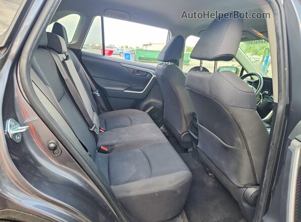 JTMF1RFV4KD018799 2019 TOYOTA RAV4 Gray Vista interior trasera
