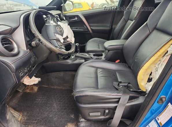 JTMJJREV7JD219994 2018 TOYOTA RAV4 Синий Вид салона спереди