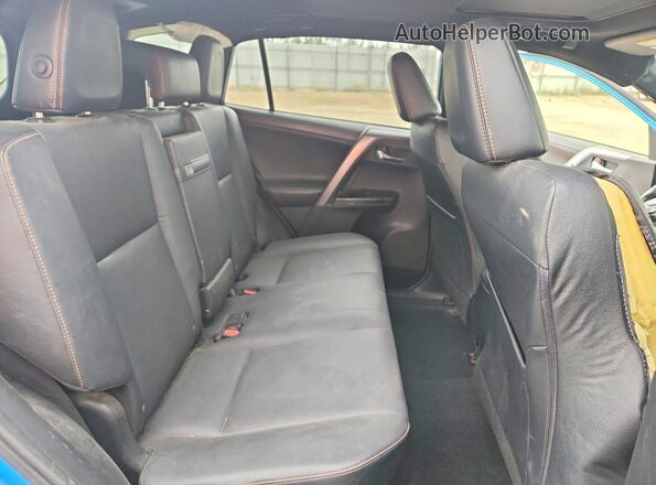 JTMJJREV7JD219994 2018 TOYOTA RAV4 Синий Вид задней части салона