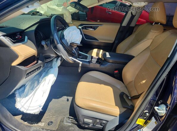 JTMN1RFV0MD074074 2021 TOYOTA RAV4 Blue Front interior view