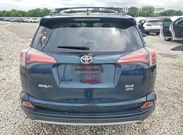 JTMRFREV3HJ161995 2017 TOYOTA RAV4 Blue Rear view