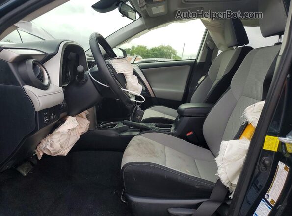 JTMRFREV3HJ161995 2017 TOYOTA RAV4 Blue Front interior view