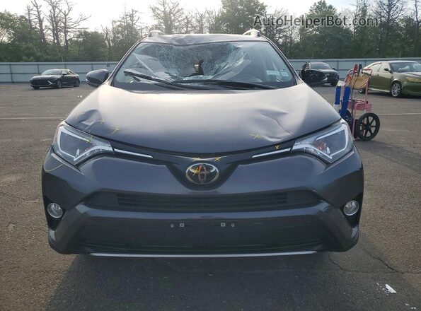 JTMRFREV5JJ742078 2018 TOYOTA RAV4 Gray Вид спереду