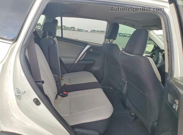 JTMRFREV7GJ090234 2016 TOYOTA RAV4 White Հետևի նստատեղերի տեսք
