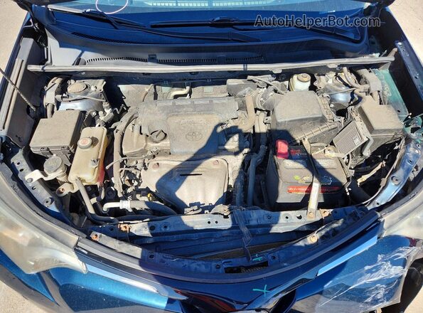 JTMRFREVXJJ212446 2018 TOYOTA RAV4 Blue Widok wnętrza z tyłu