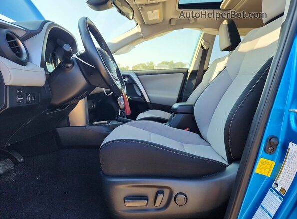 JTMRJREV3JD245320 2018 TOYOTA RAV4 Blue Widok wnętrza z przodu