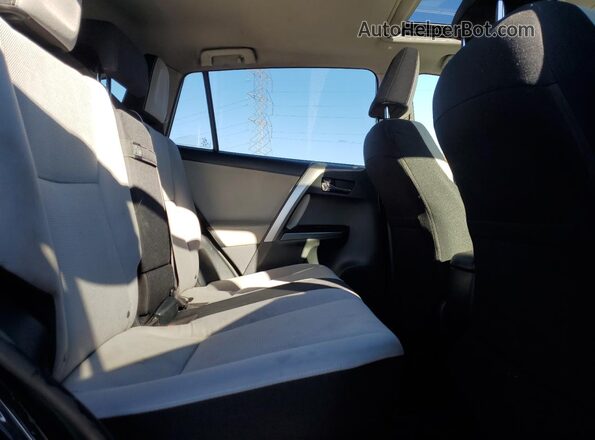JTMRJREV7GD022464 2016 TOYOTA RAV4 Black Widok wnętrza z tyłu
