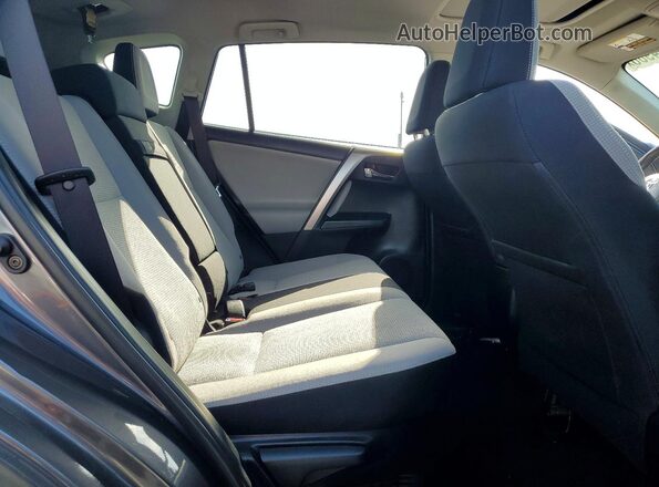 JTMRJREV7HD093794 2017 TOYOTA RAV4 Gray Widok tylnych siedzeń