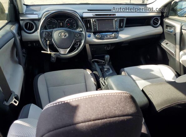 JTMRJREV7HD093794 2017 TOYOTA RAV4 Gray Widok deski rozdzielczej
