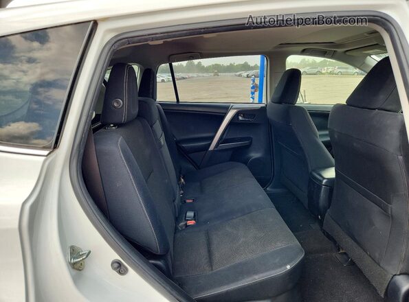 JTMRJREVXGD013046 2016 TOYOTA RAV4 White Vista interior trasera