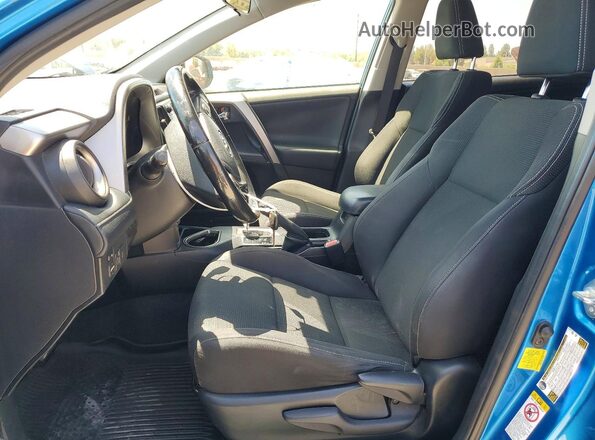 JTMWFREV0JJ193229 2018 TOYOTA RAV4 Blue Вид салону спереду