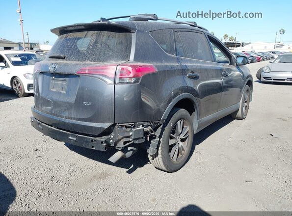 JTMWFREV3JD128423 2018 TOYOTA RAV4 Gray Rear right